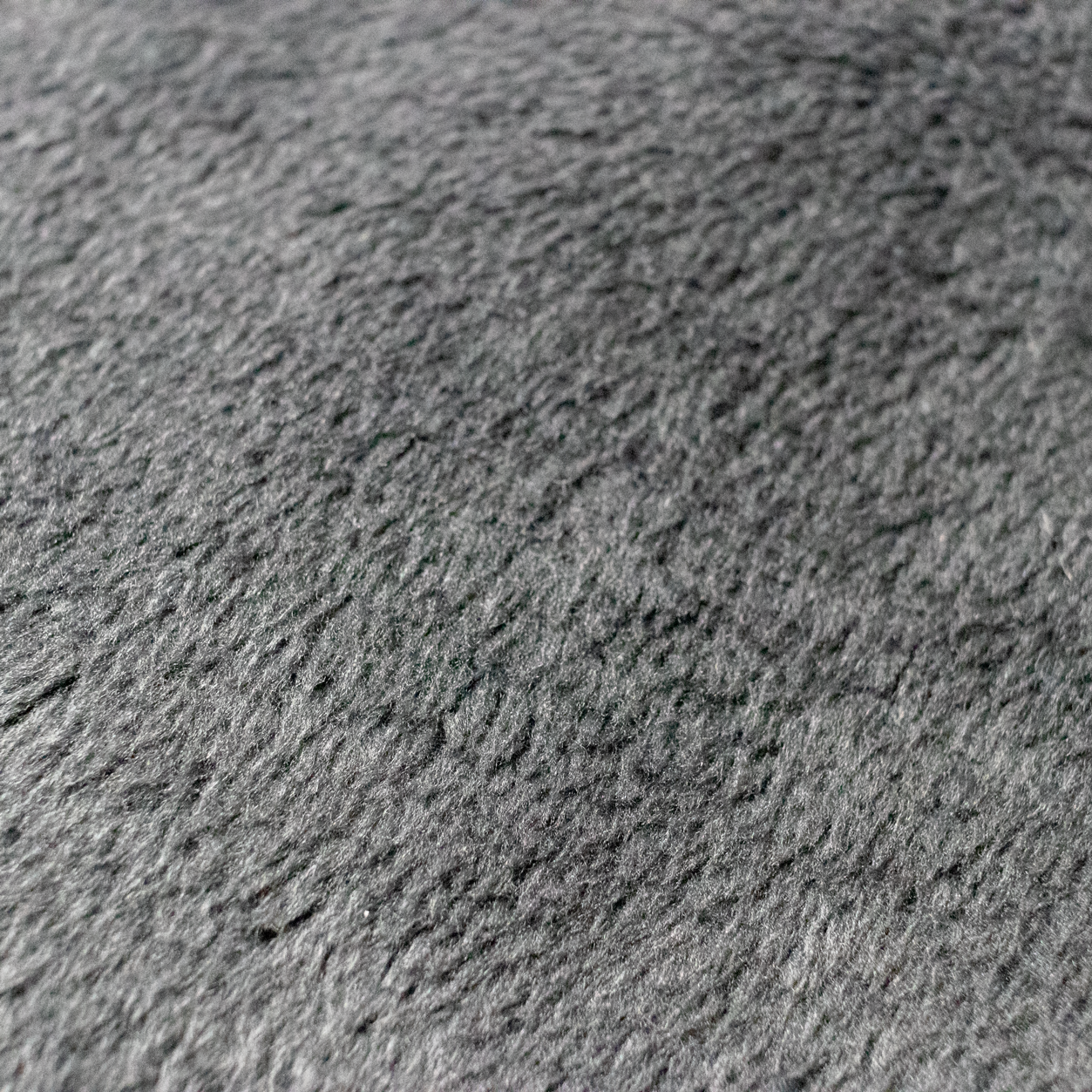 Decke gefüttert aus grau Plüsch